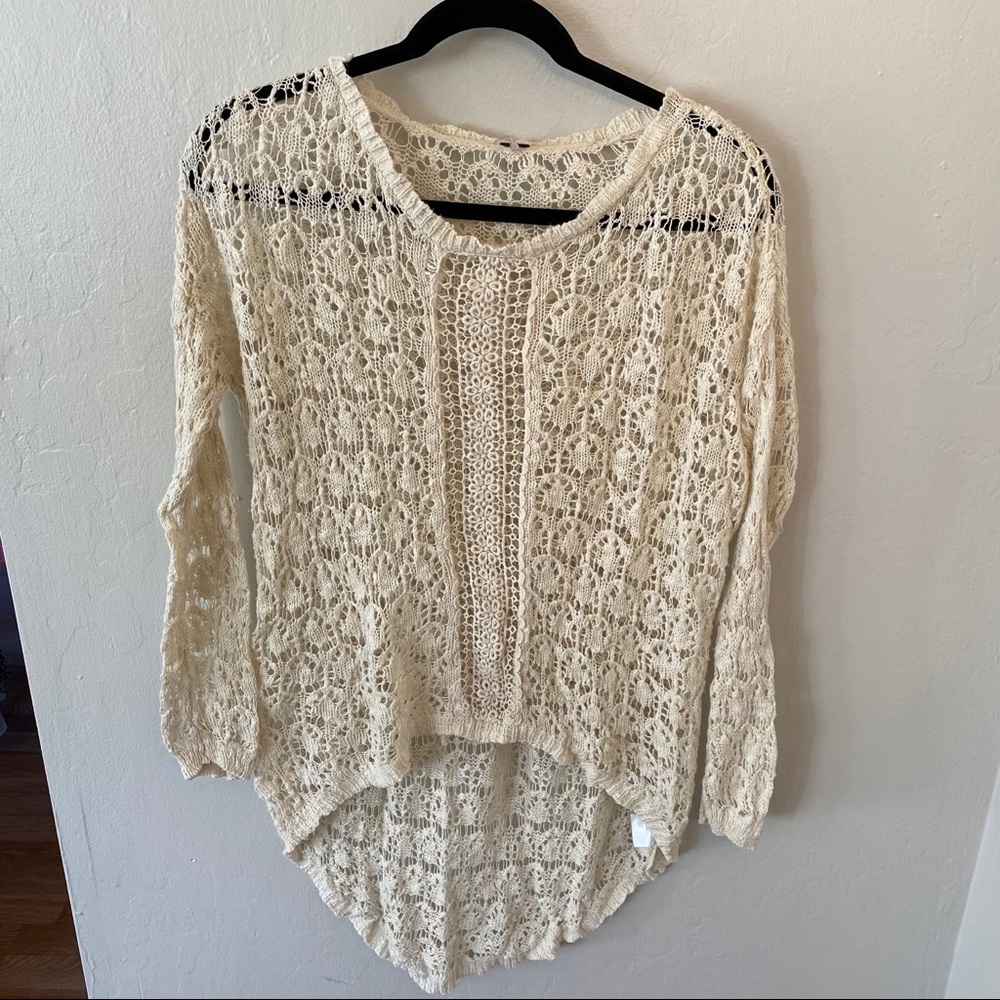 Knitted cream sweater